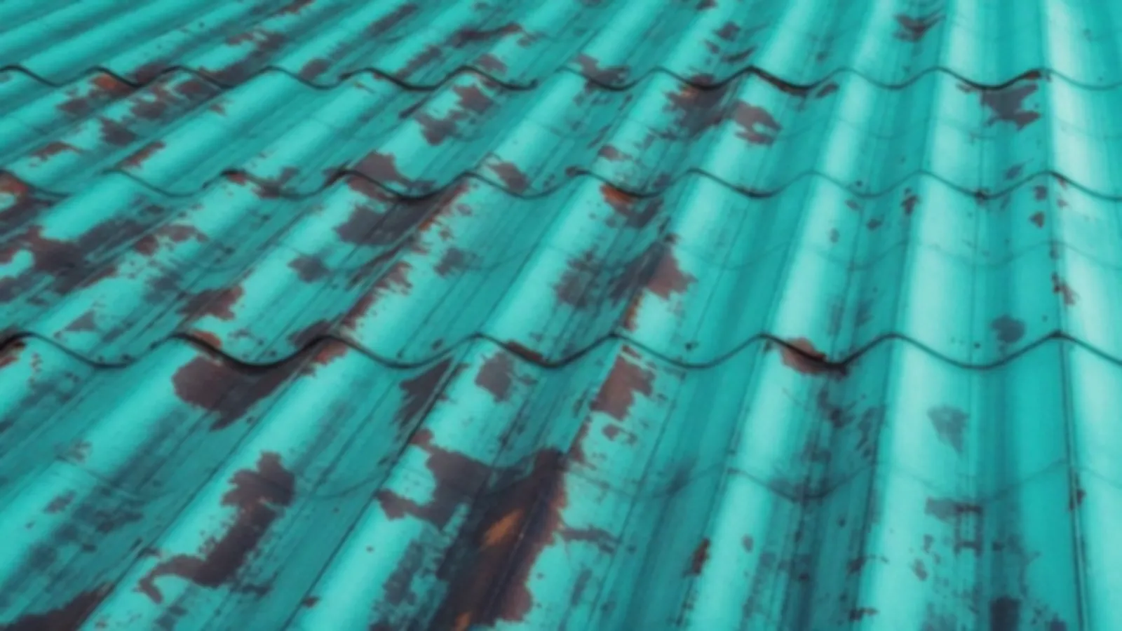 Weathered green verdigris copper roof panels against a pale blue sky, the CopperQuotes view of small loan offers online, $100 – $5,000